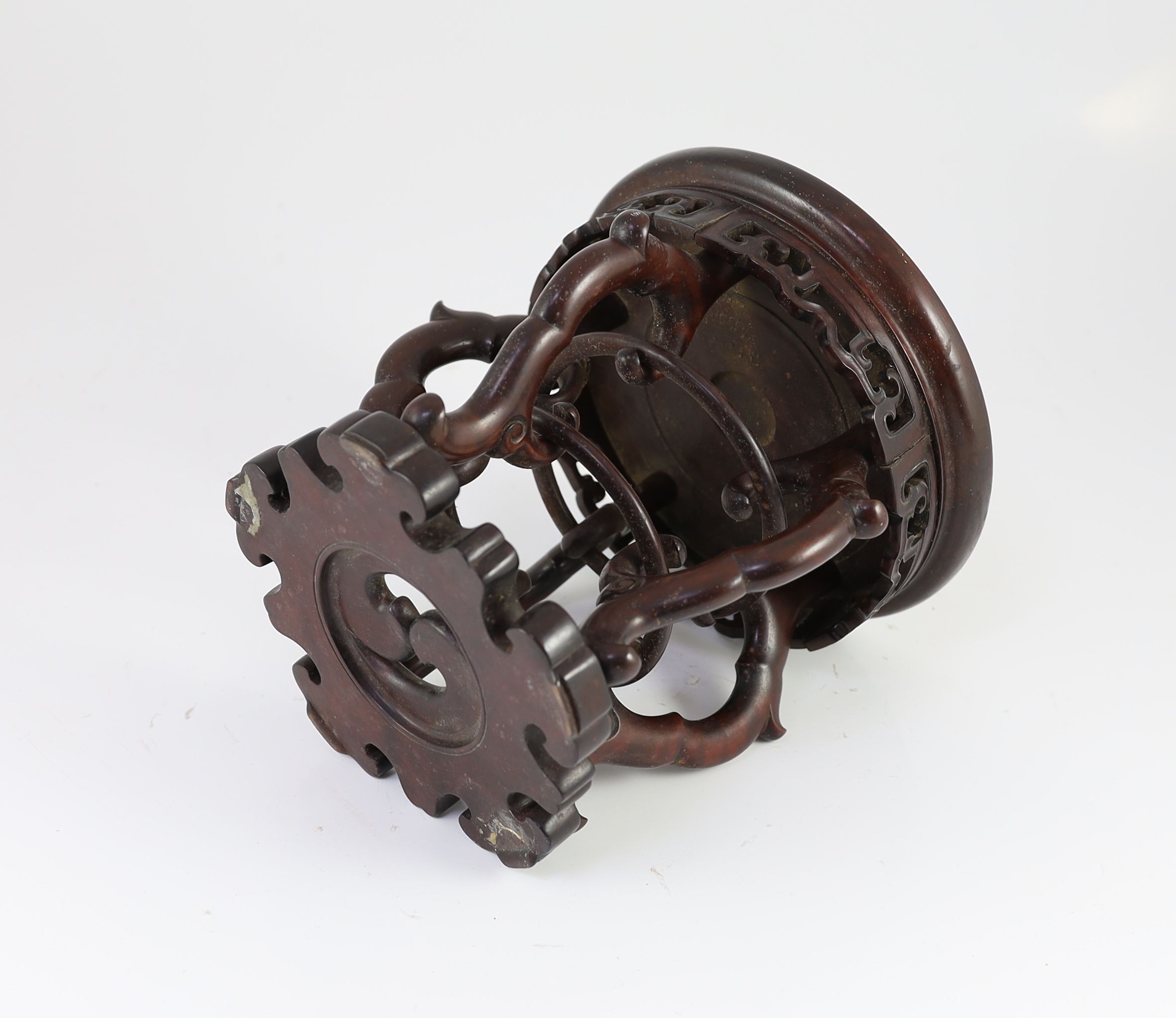 A Chinese hardwood stand, 19th century, 21.5cm high